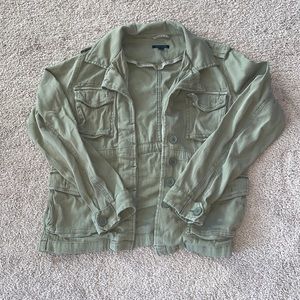 Green jean jacket from Tommy Hilfiger.  Has pockets and is a button up.